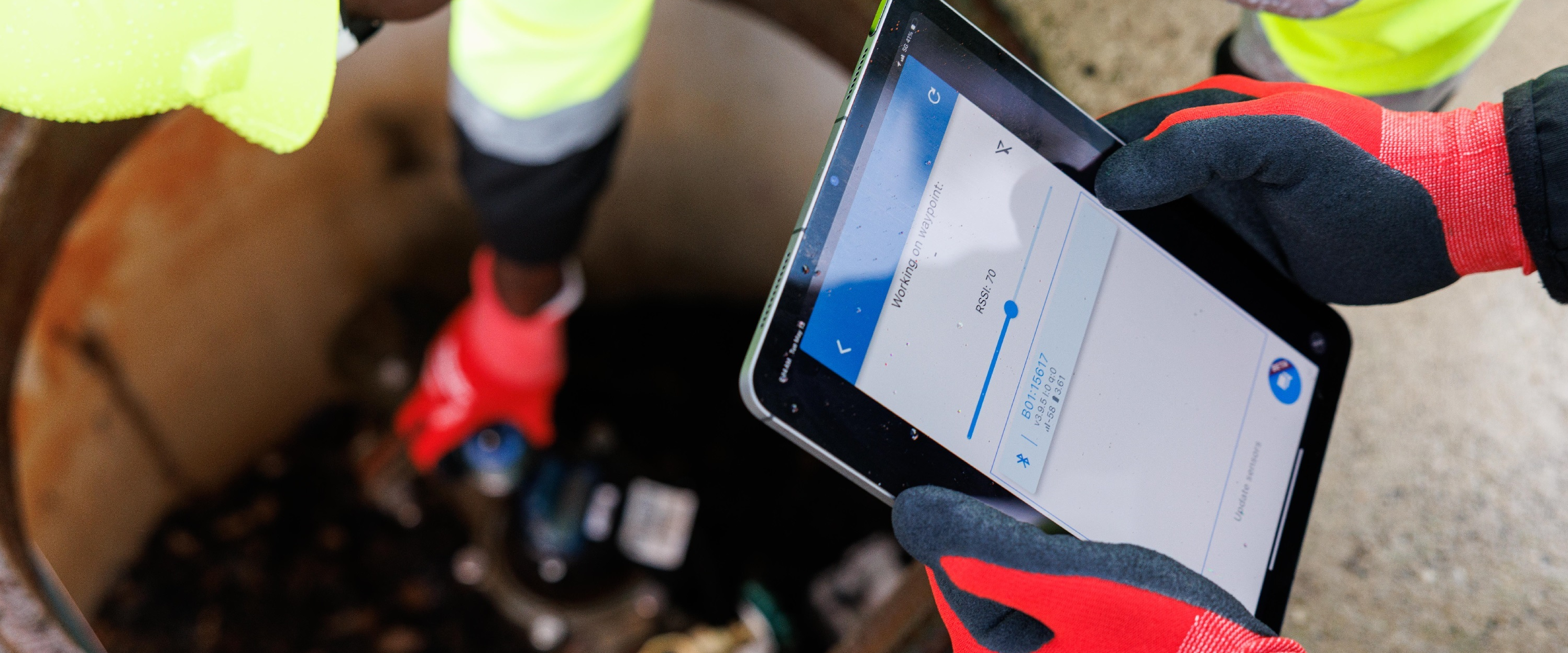 An image of a CivilSense technician deploying acoustic sensors as part of a smart infrastructure leak detection project
