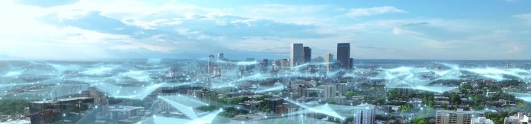 Digital graphic of connected lines over a green, futuristic smart city, symbolizing advanced connectivity and sustainable urban design